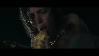 Linda Liddle throws up on Bradley after saving him from almost drowning during an attempt to leave the island in Send Help